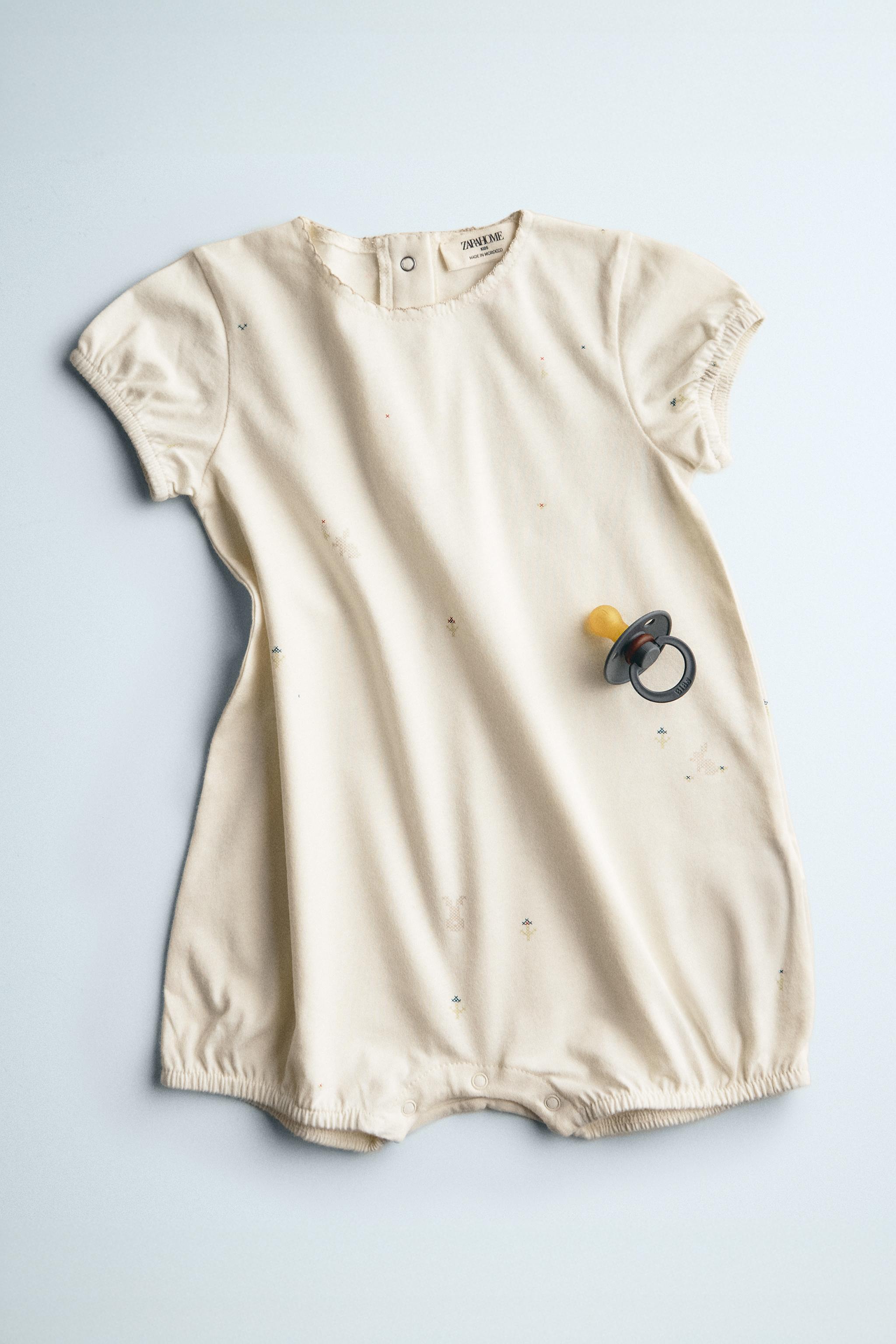 KIDS RABBIT & FLOWER FOOTED ROMPER